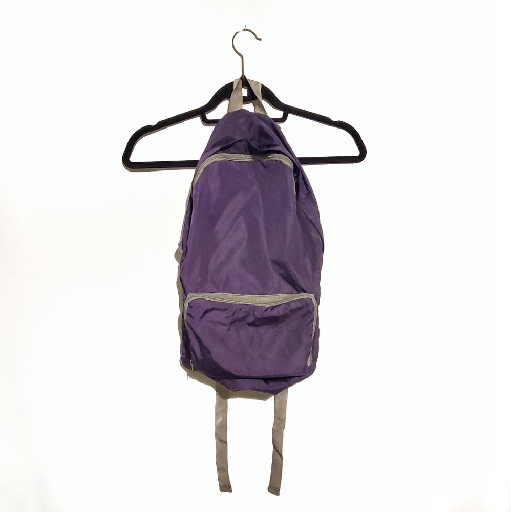 Purple softside nylon backpack. New no tags.